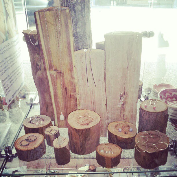 wooden logs used to make jewellery display jewelry